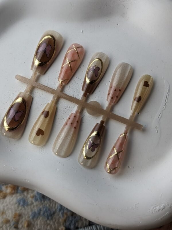 1000057938 Golden Butterfly & Heart Printed Press-On Nails