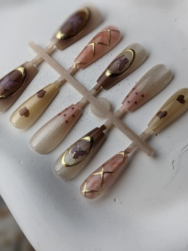 1000057939 Golden Butterfly & Heart Printed Press-On Nails