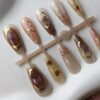 1000057940 Golden Butterfly & Heart Printed Press-On Nails